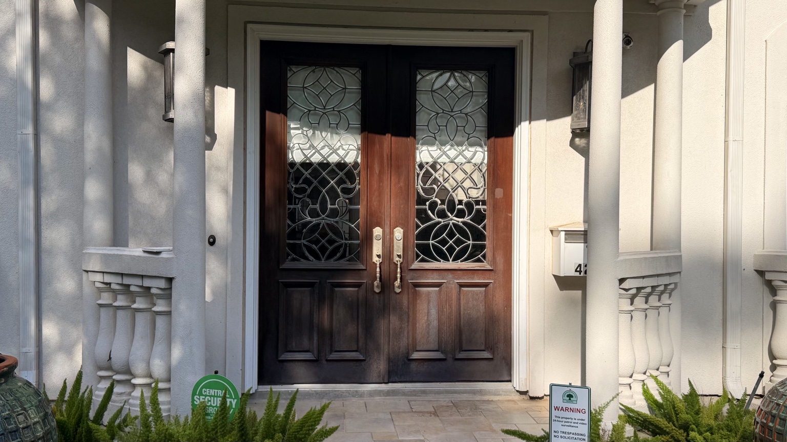 Wood double entry doors before preparation and refinishing